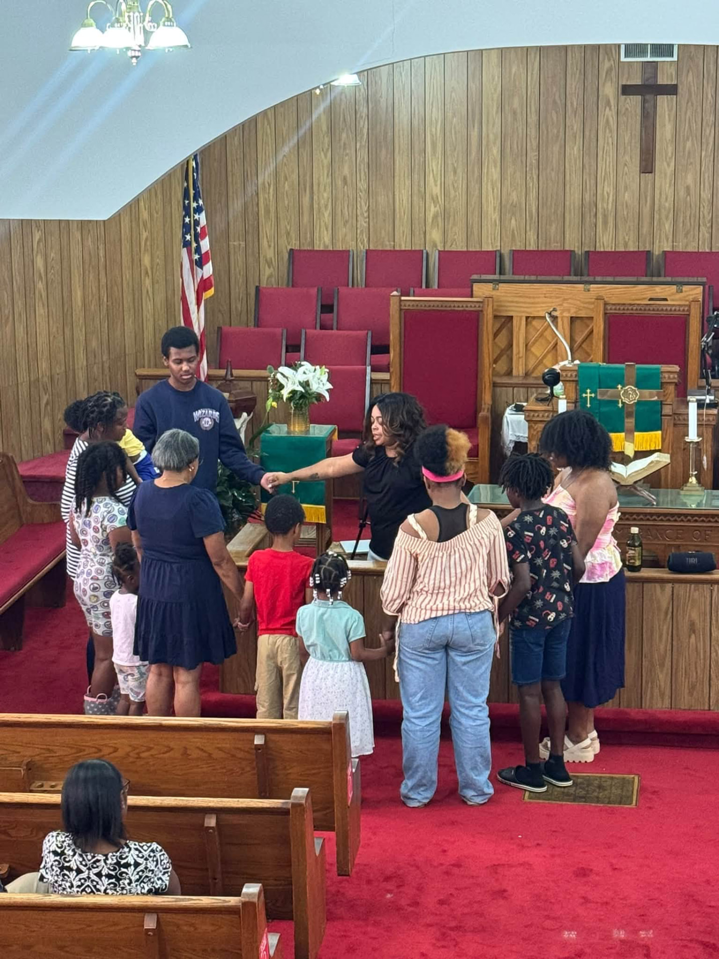 Joining hands in prayer